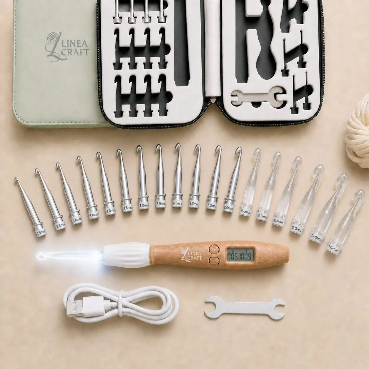 LineaCraft counting crochet hook with its light on, 18 hook tips, charging cable and sage green case